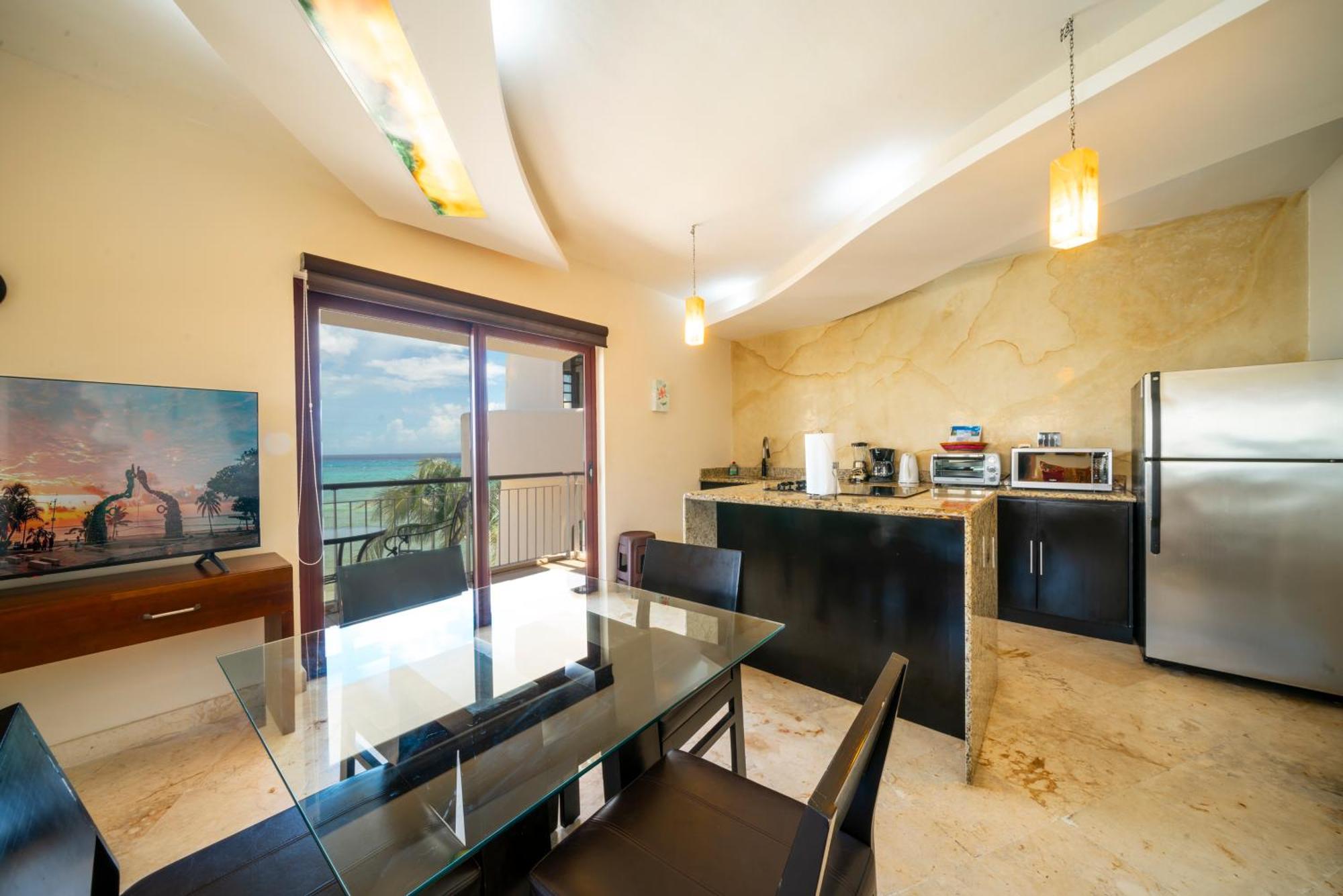 Сasa de vacaciones Surf 407 - Beachfront Oceanview 1 Bedroom - At El Faro Playa del Carmen