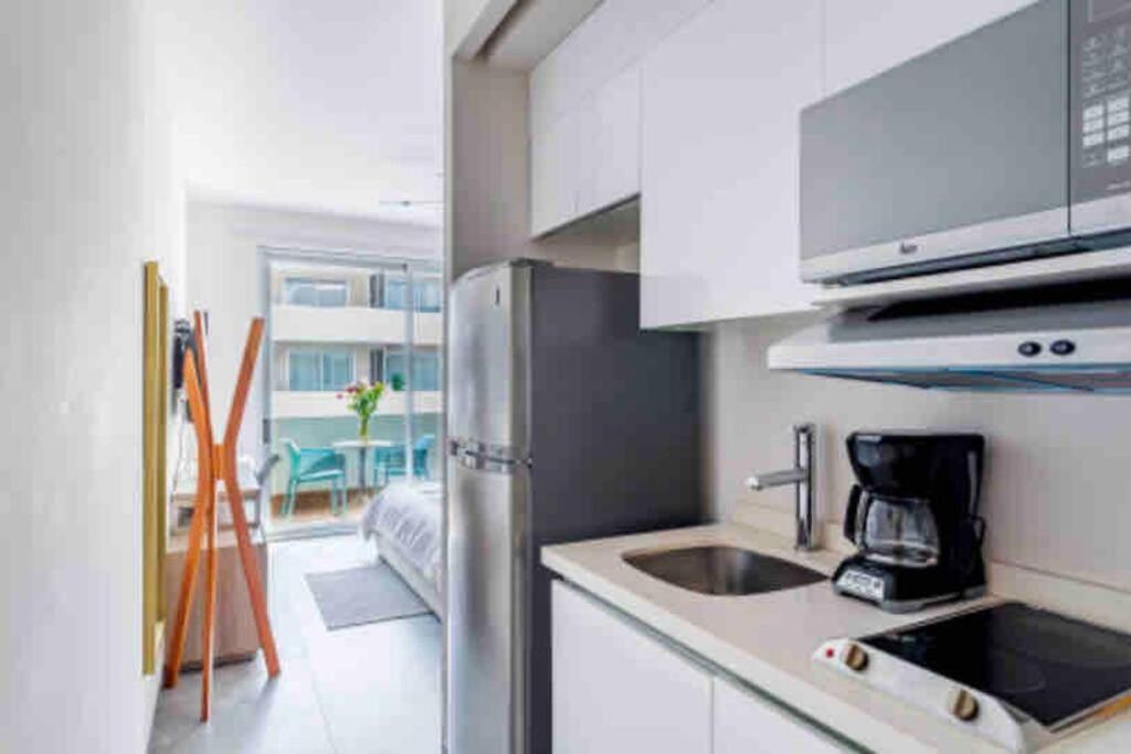 Ideally Located Steps From The 5th Avenue *