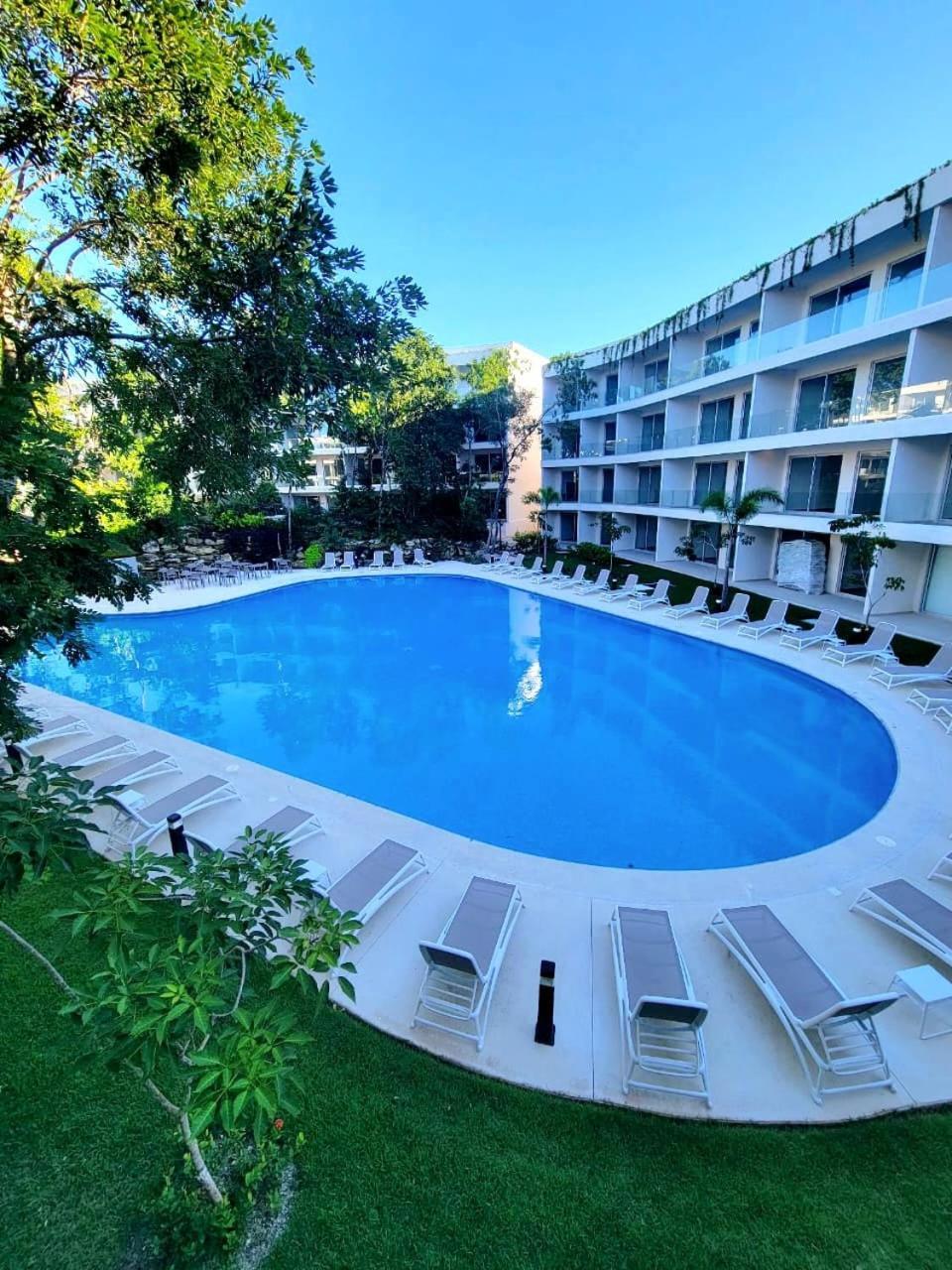 Modern Playacar With Poolside Views & Nature Apartment Playa del Carmen