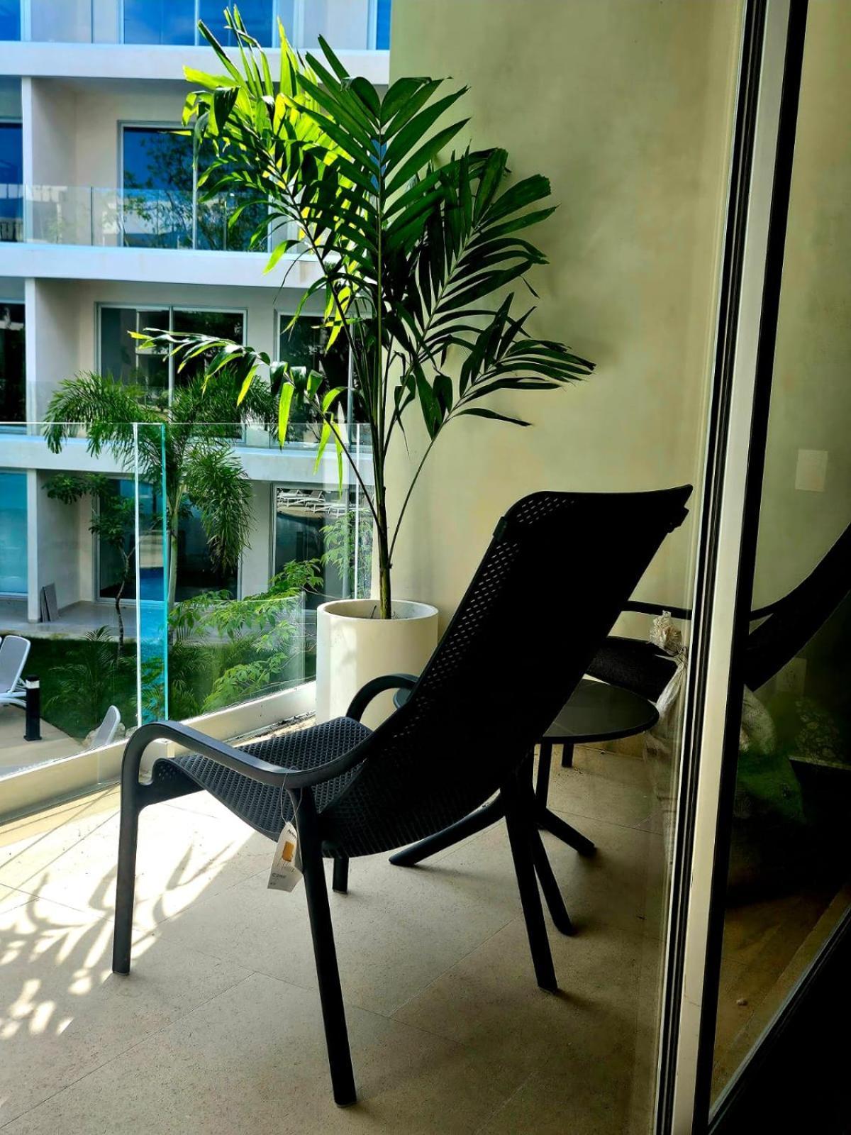 Modern Playacar With Poolside Views & Nature Apartment Playa del Carmen